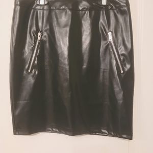 Brand new with tags womens faux leather skirt with zipper detail.